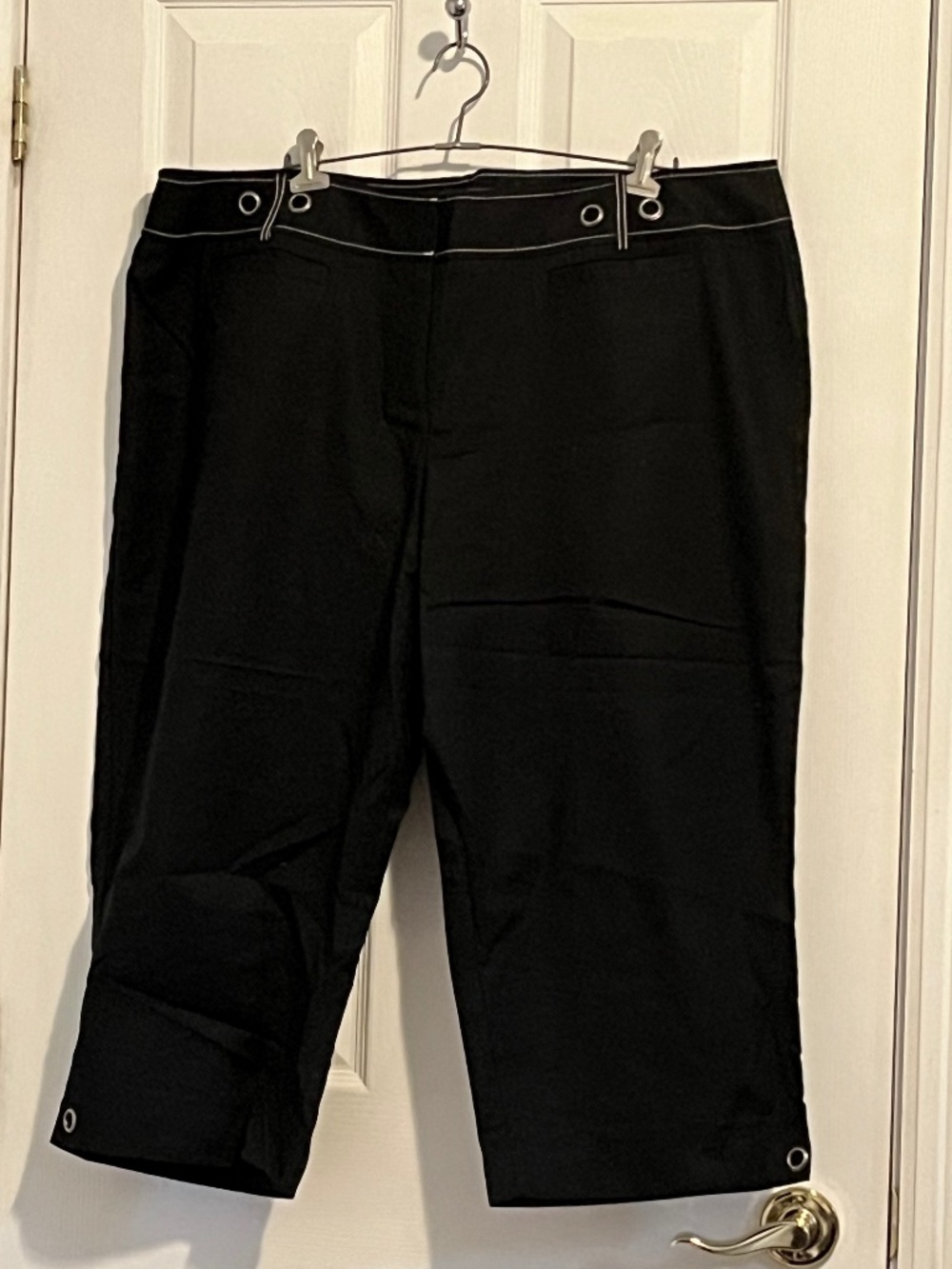 Black light weight capri with white stitching and rivet accents
